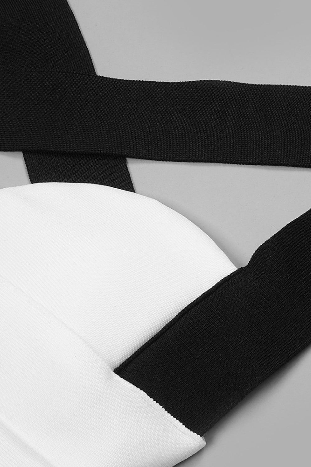 Two-Tone Crisscross Cropped Top and Slit Flare Pants Set - Outlets Forever