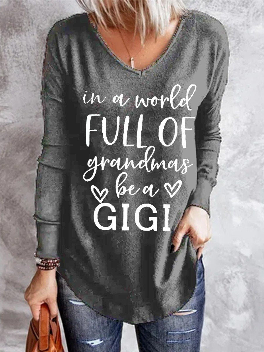 Women In A World Full Of Grandmas Be A Gigi V-neck Long Sleeve Top - Outlets Forever