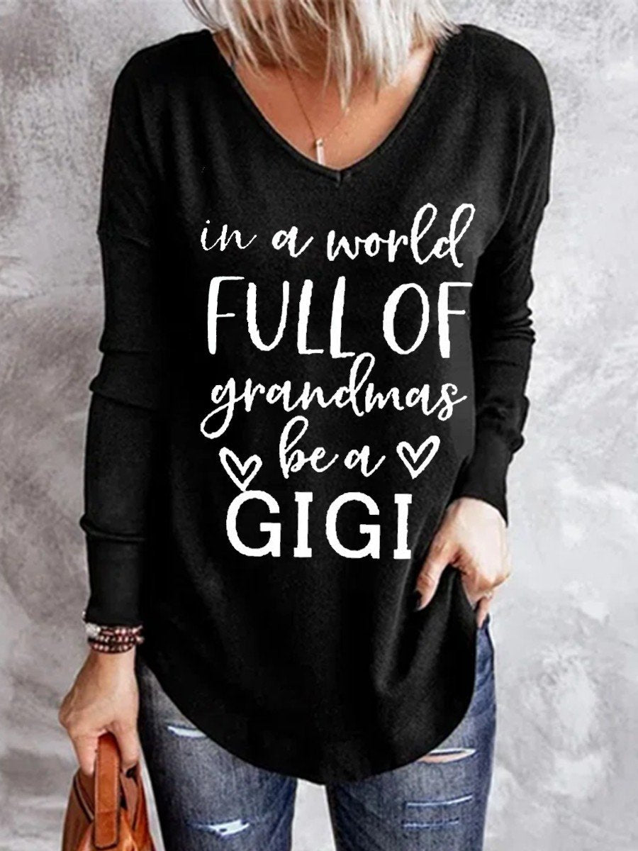 Women In A World Full Of Grandmas Be A Gigi V-neck Long Sleeve Top - Outlets Forever