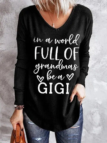 Women In A World Full Of Grandmas Be A Gigi V-neck Long Sleeve Top - Outlets Forever